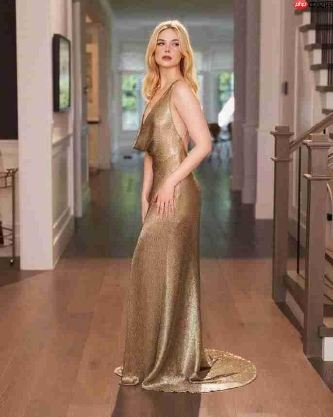 艾丽范宁活动写真图赏 穿深V长裙秀绝美腰臀