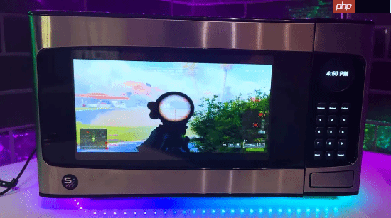 微波炉爆改高配游戏PC!门是显示屏、主板放在转盘